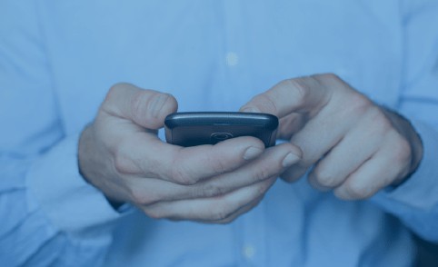 Looking on a phone for ways to solve Debt