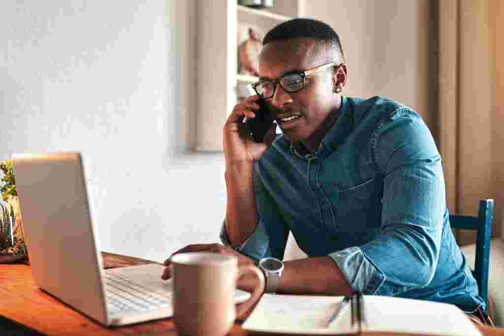 man making a call about Payment Deferral Programs