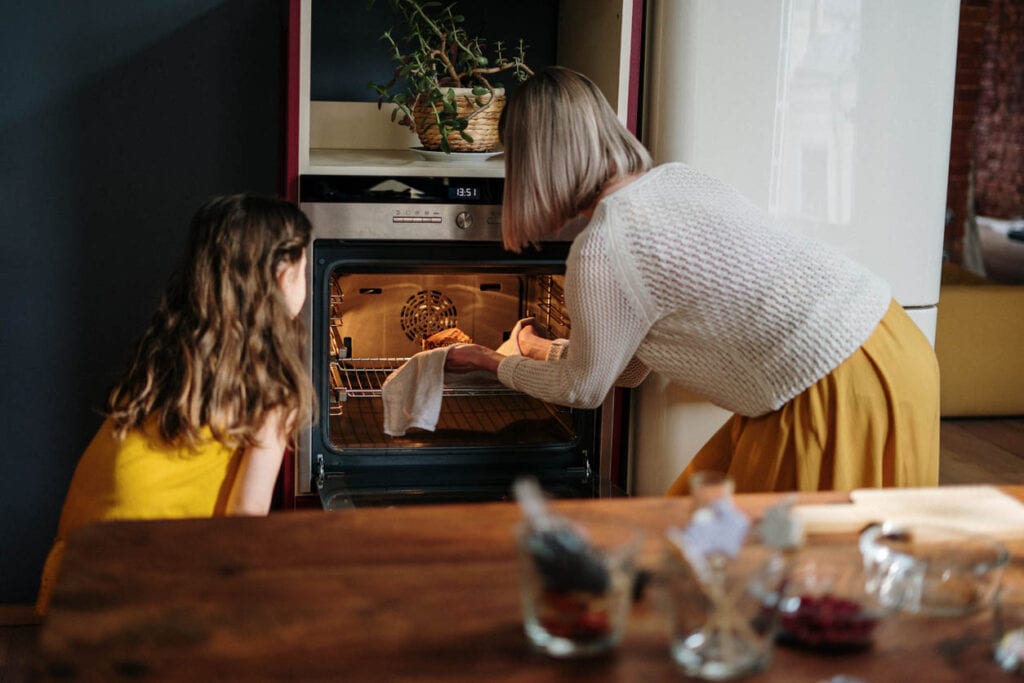 mother and daughter talking about debt and living debt free