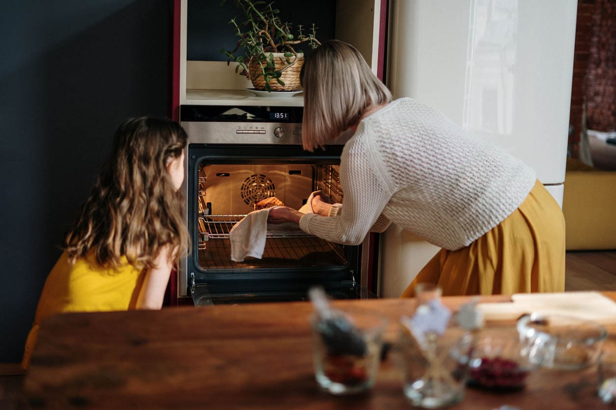 mother and daughter talking about debt and living debt free