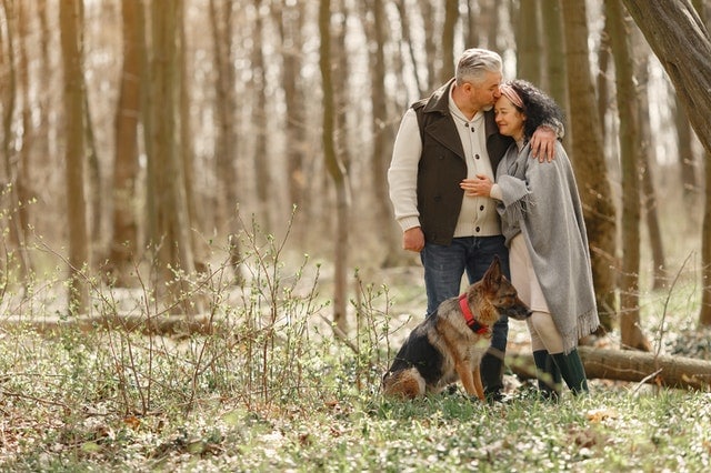 an older couple going for a walk, talking about the debt